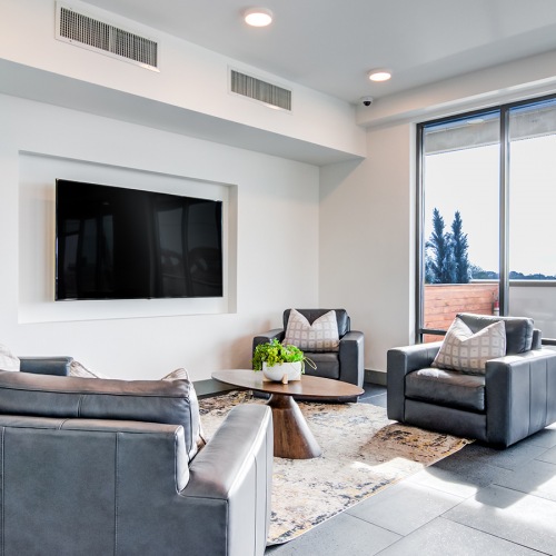 resident clubhouse with a chairs and coffee table resident clubhouse with a chairs and coffee table