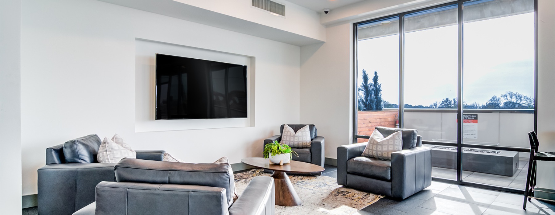 resident clubhouse with a chairs and coffee table